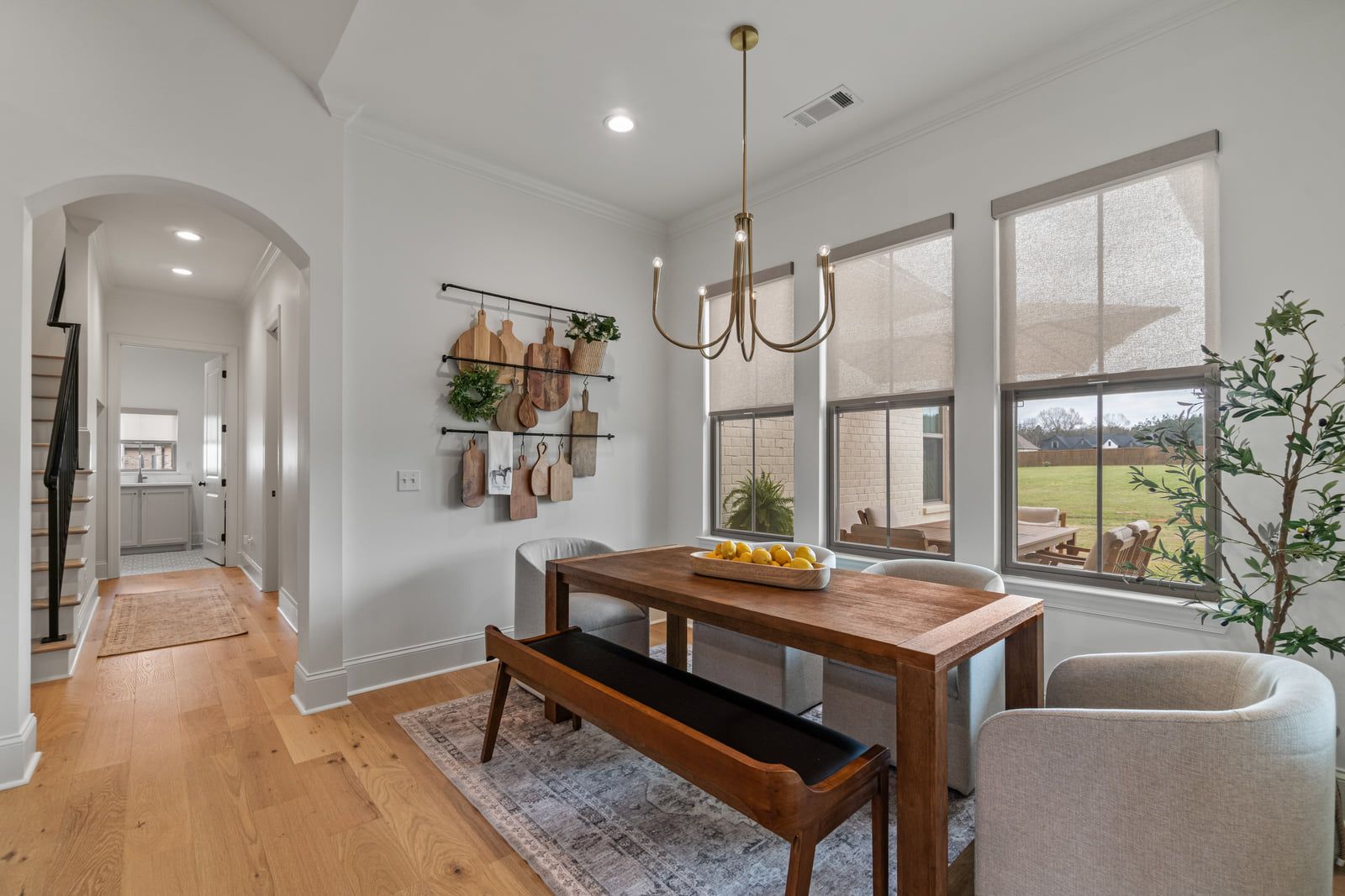 Dining area with the hall and staircase beyond.